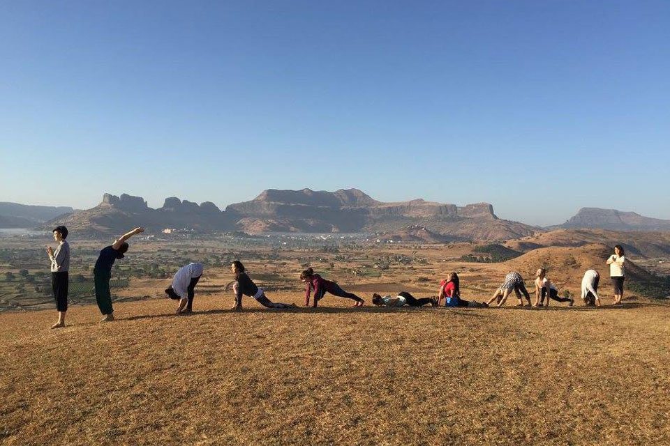 Yoga Students Enjoying Outdoor Sun-Saluatations at YogaPoint-Yoga Vidya Dham During Yoga Teacher Training Program