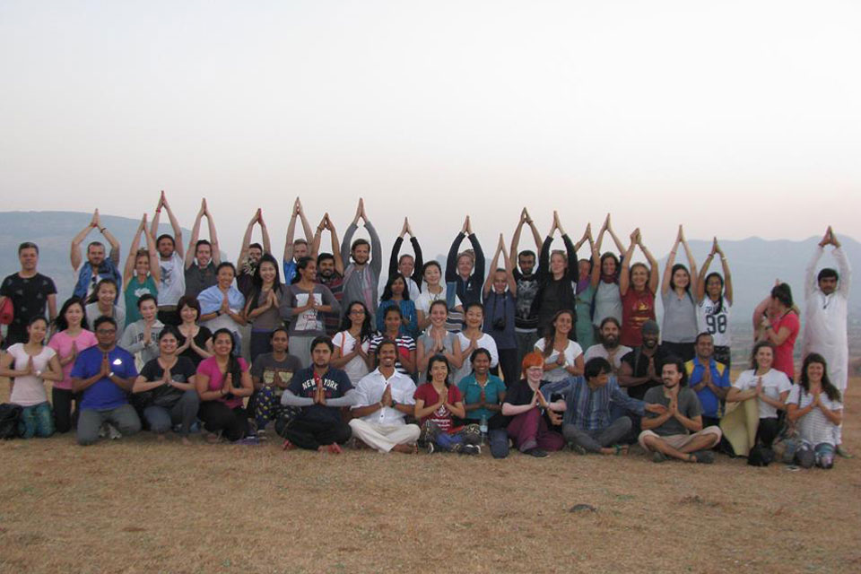 Yoga Students Enjoying Tree Pose at YogaPoint-Yoga Vidya Dham during Yoga Teacher Training Program